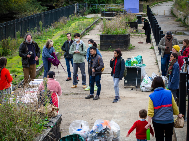 Gathering for a clean-up event and ecology talk